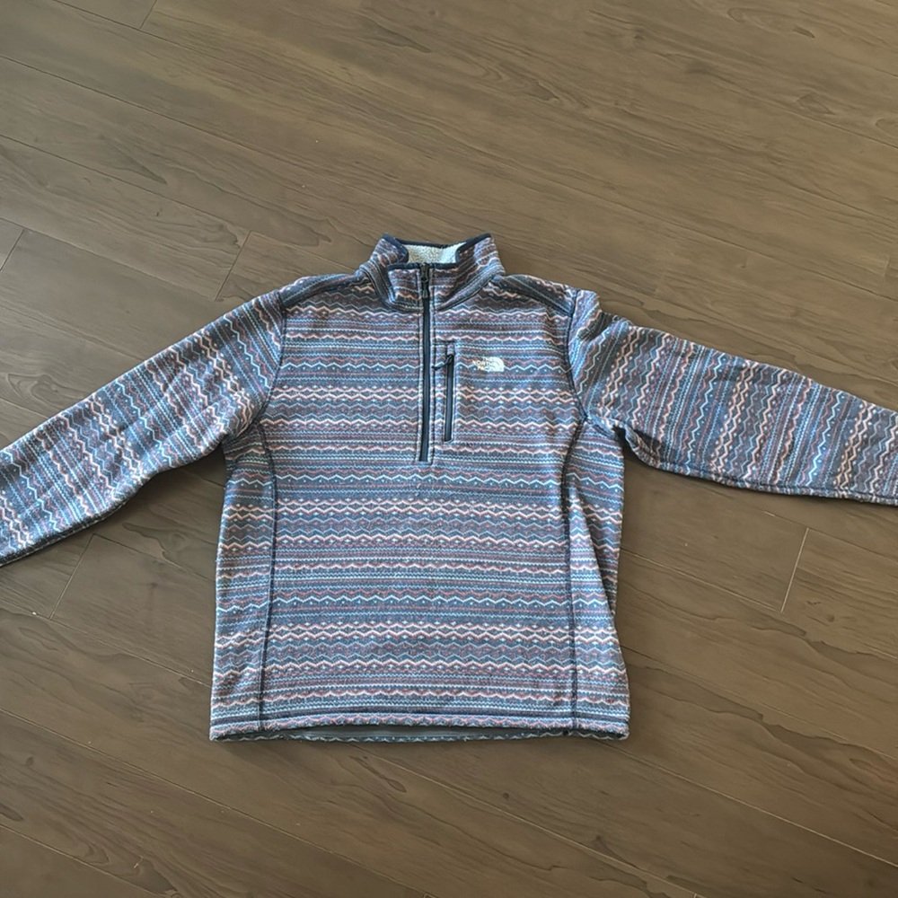The north face blue and white quarter zip fleece